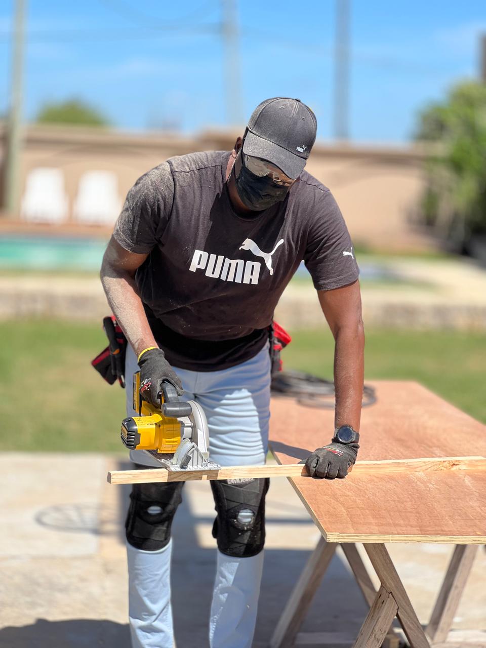 FirstCorte founder teaching woodworking at home